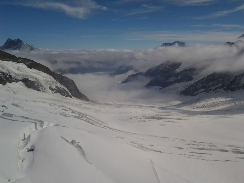 Alpine Majesty: Bern to Jungfraujoch Exclusive Private Tour - Walking through the Ice Palace