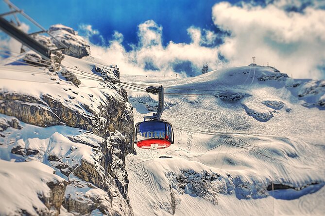 Alpine Majesty:Exclusive Private Tour to Mount Titlis from Luzern - Riding the gondolas toward Mount Titlis