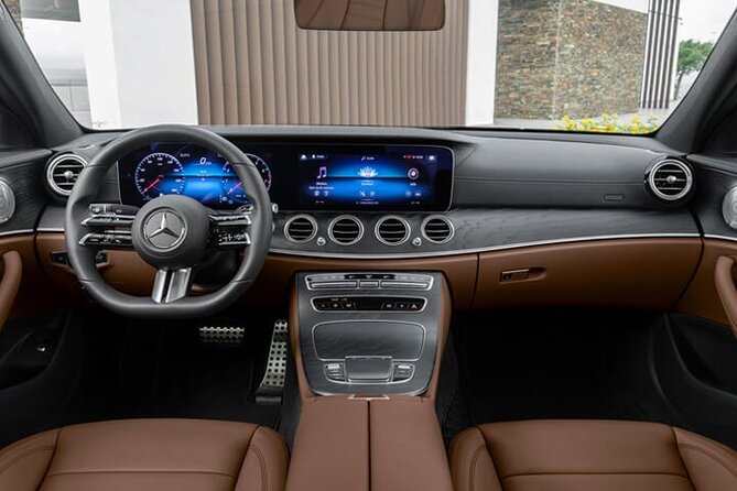 Arrival from Basel Airport BSL to Basel City by Business Car - A private Mercedes E-Class for up to three people