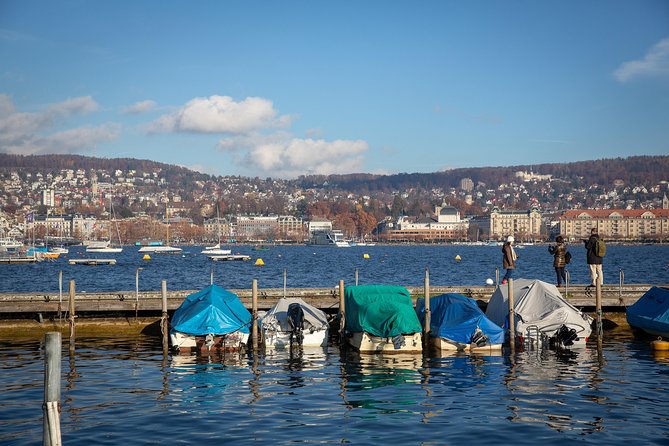 Best of Zurich Tour with Felsenegg Cable Car and Ferry Ride - Altstadt on foot: guild houses, St. Peter’s, and Fraumünster