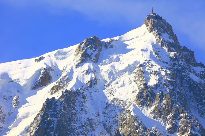 Chamonix Ski Day from Geneva with Optional Aiguille du Midi - Collecting skis at Sport 2000 Hire Des Planards