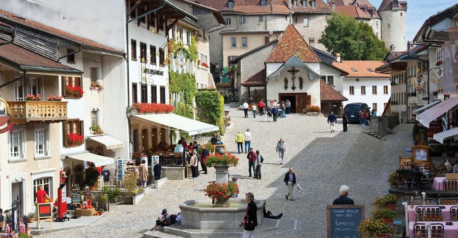 From Geneva: Gruyères Private Tour Cheese & Chocolat Factory - Maison Cailler, where chocolate becomes a show