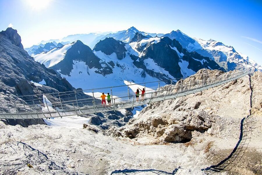 From Lucerne: Mount Titlis Half-Day Tour with Ice Flyer - Crossing the Cliff Walk suspension bridge