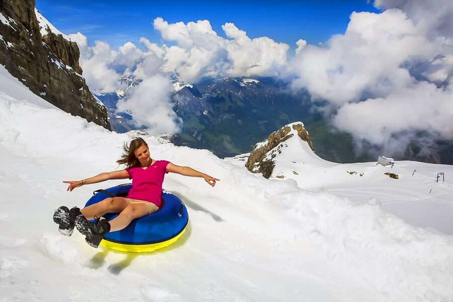 From Lucerne: Mount Titlis Half-Day Tour with Ice Flyer - Taking the Ice Flyer across the glacier