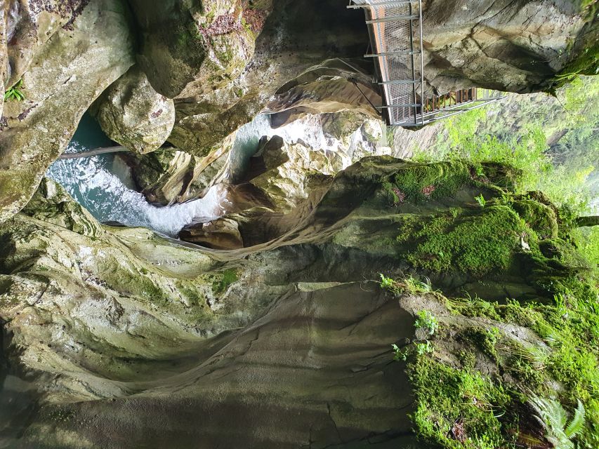 From Zurich: Waterfalls Valley & Aareschlucht Gorge Day Tour - Trummelbach Falls puts the water right beside you