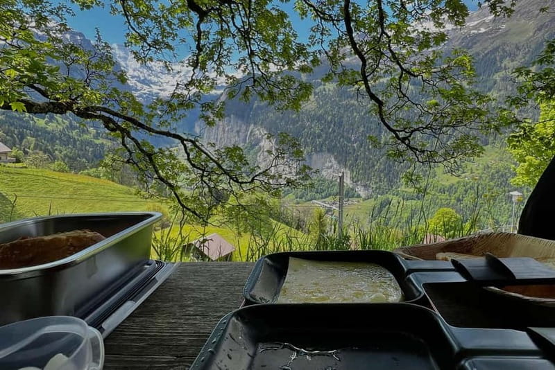 Interlaken: Explore Lauterbrunnen, Wengen & Raclette Tasting - Raclette with a mountain view