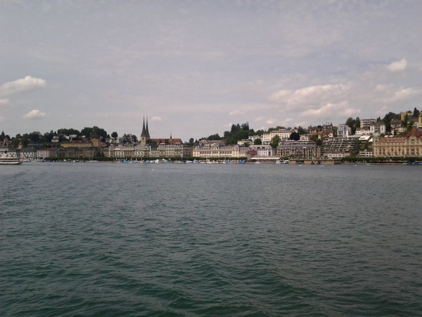 Luzern Elegance: Private City Walk and Panoramic Lake Cruise - From city streets to Lake Lucerne