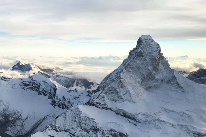 Matterhorn helicopter tour - longest scenic flight from Bern over the Swiss Alps - Oeschinensee from above
