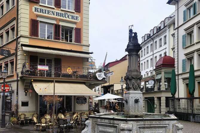 Private city tour in lucerne - Crossing the Spreuer Bridge