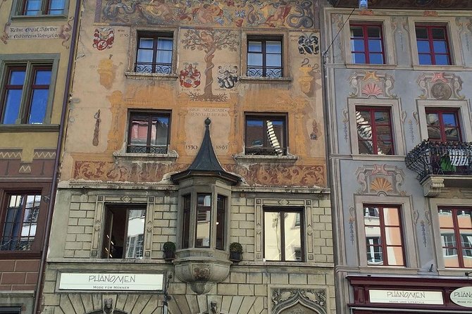 Private Classic Lucerne City Walk - Entering Ritter Palace and viewing the Danse Macabre