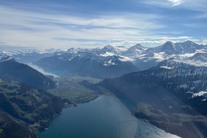 Private Swiss Alps helicopter tour over snow covered mountain peaks and glaciers - Flying past the Eiger north face