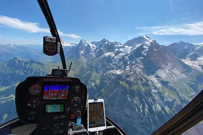Private Swiss Alps helicopter tour over snow covered mountain peaks and glaciers - Personal attention from a private pilot