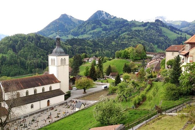 Private Swiss Cheese and Chocolate Tour from Interlaken - Gruyères, cheese dishes, and castle views