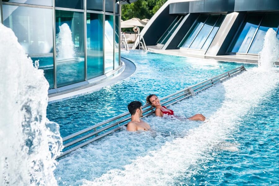 Rivera-Ticino: Splash e Spa Tamaro 4-Hour Waterpark Ticket - Indoor warmth, the pool bar, and 80 water jets