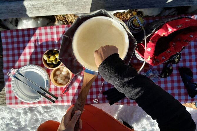 Sledding Cheese Fondue, Chocolate - A fondue stop with Eiger country around you