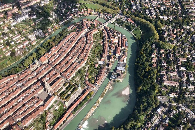 Swiss Capital city helicopter sightseeing tour - the ideal flight to see Berne - Wankdorf Stadium and the Big YB logo