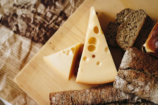 Taste Lausanne – A Full Swiss Food Tour by Do Eat Better - Vaud cheeses beside Notre-Dame