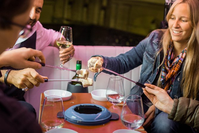 Zurich eTukTuk Private Tour - with Cheese Fondue and Wine - A Swiss dinner with three wheels