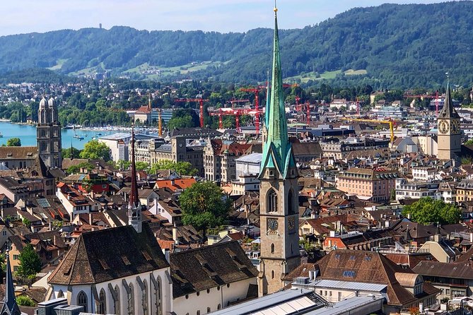 Zurich Highlights In A 2+ Hour Walking Tour Including Panoramic Views - Grossmünster and the panoramic finish above the streets